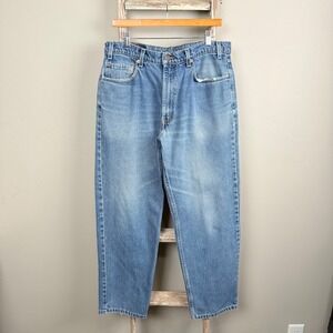 Vintage 90s Levi 550 Relax Fit Blue Denim Zip Fly Jeans size 35x29, USA